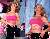 Britney in shocking pink and black PVC trousers at concert